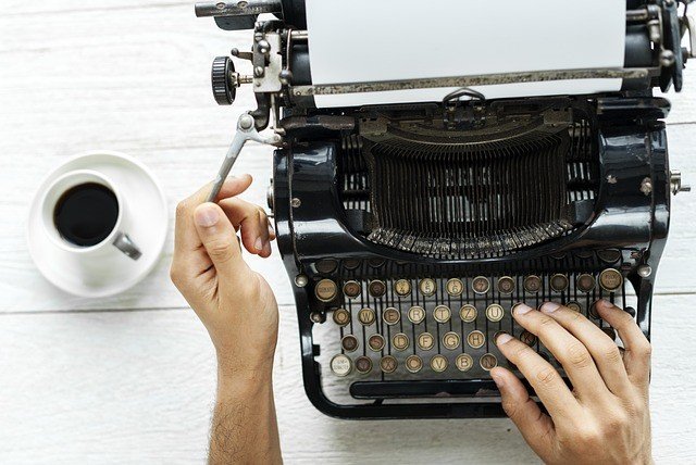Book writing, typewriter, coffee